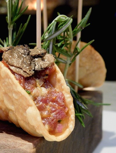Black Angus Steak Tartare Taco topped with Black Truffle, and served with Truffle Aioli