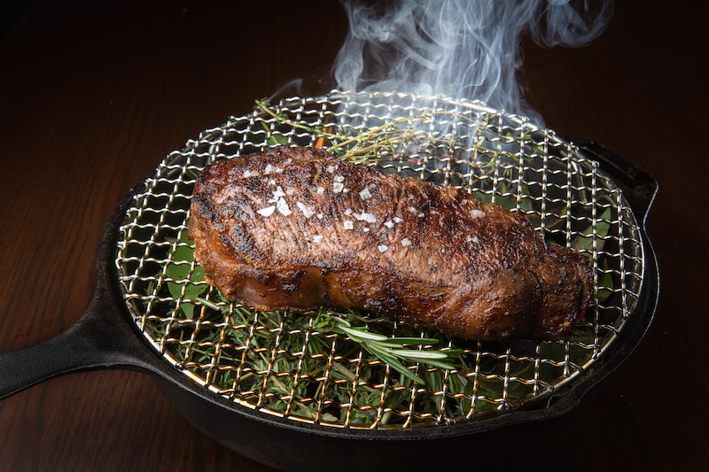 Butcher & Banker NY Strip over Smoking Herbs 1 by Pap Studio