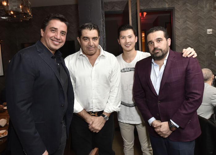 NEW YORK, NY - MARCH 19: Leonardo Solis, Paolo Zampolli, Seth Semilof, and Andre Koo attend the Haute Living And Louis XIII Celebration of Scott Eastwood At Scarpetta NYC on March 19, 2018 in New York City. 