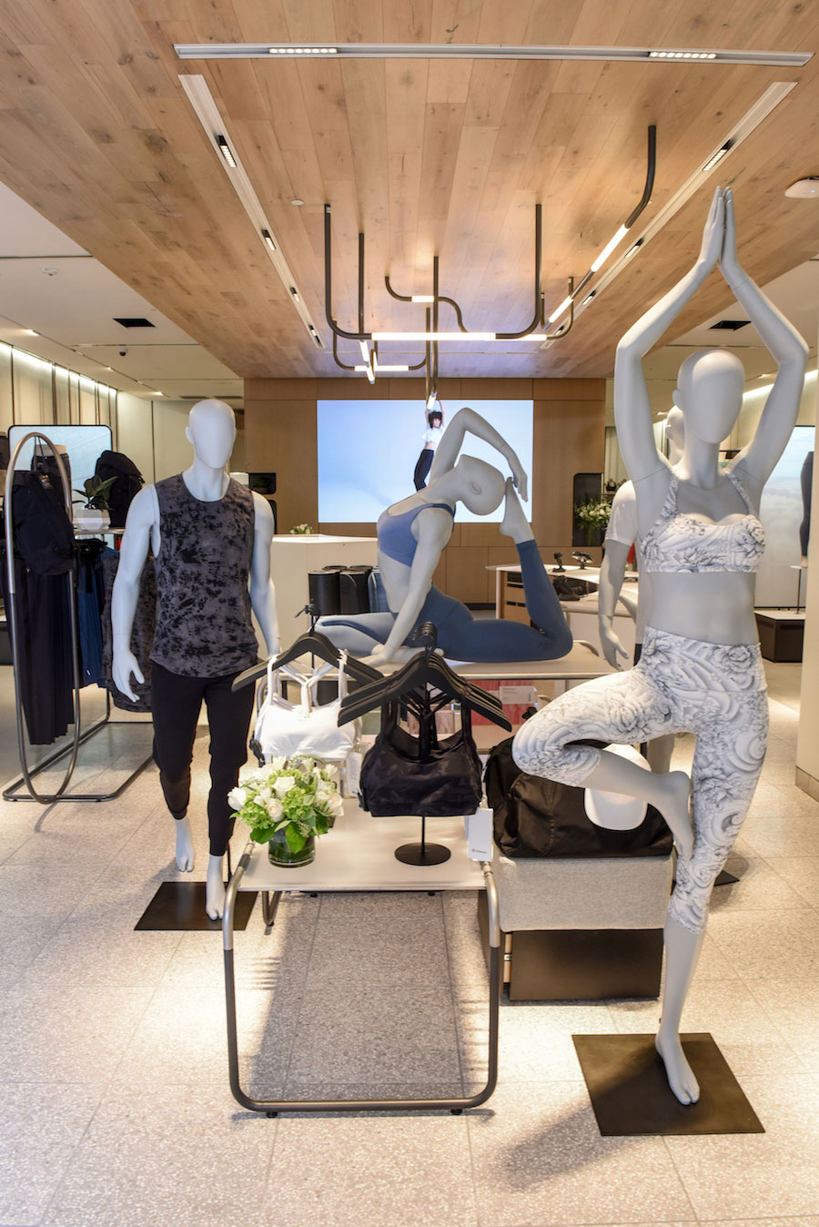 The mannequins at the new store are in more active positions than traditional mannequins. 