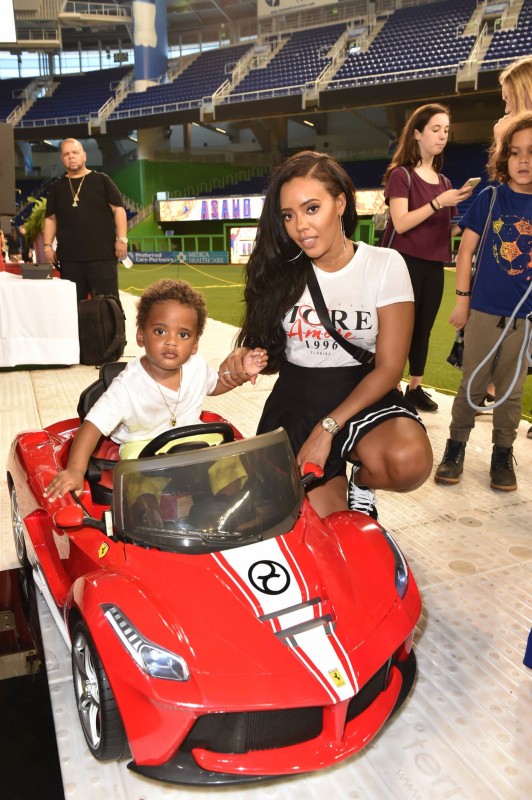 Angela Simmons and her son in Cybex LaFerrari