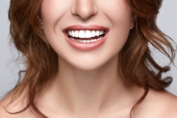 Show Off Your Spotless Smile: The Top Five Healthy Smile Secrets