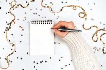 Festivedecorations,And,Notebook,With,Wish,List,On,White,Rustic,Table,