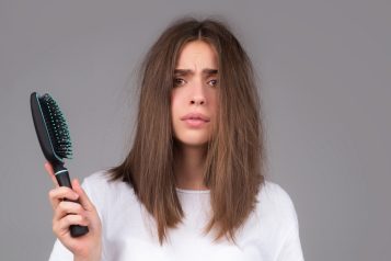 Young,Woman,Is,Very,Upset,Because,Of,Hair,Loss.,Haircut