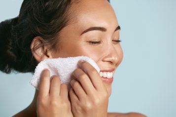 Woman,Cleaning,Facial,Skin,With,Towel,After,Washing,Face,Portrait.