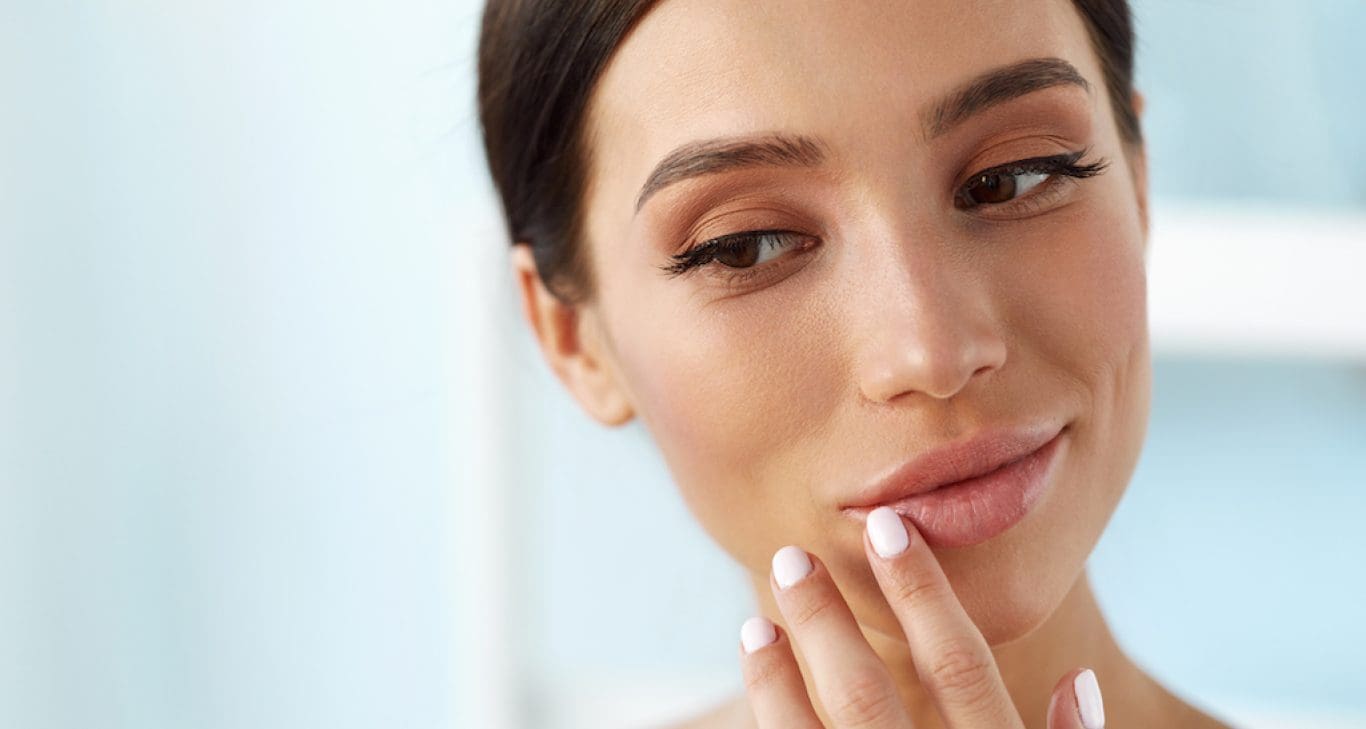 Everything You Need To Know About Plumping Your Lips With Implants