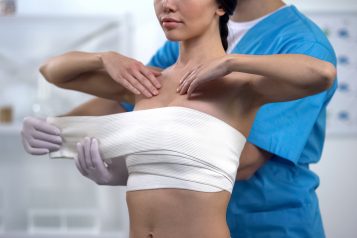 Professional,Plastic,Surgeon,Wrapping,Chest,Compression,Female,Patient,,Health
