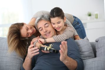 Woman,With,Daughter,Celebrating,Father’s,Day