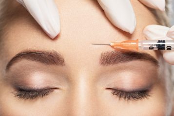 Woman,Getting,Cosmetic,Injection,Of,Botox,Near,Eyes,,Closup.,Woman