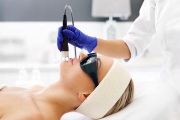Laser,Treatment,For,The,Face.,A,Woman,In,A,Beauty