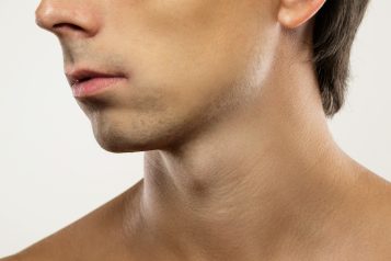 Men,Skin,Care,And,Beauty.,Closeup,Of,Clean-shaven,Male,Face.