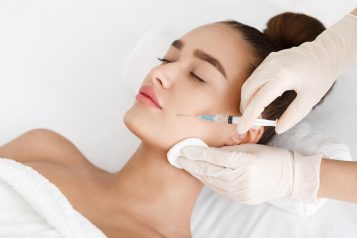 Plastic,Surgery.,Young,Woman,Receiving,Botox,Injection,In,Beauty,Clinic