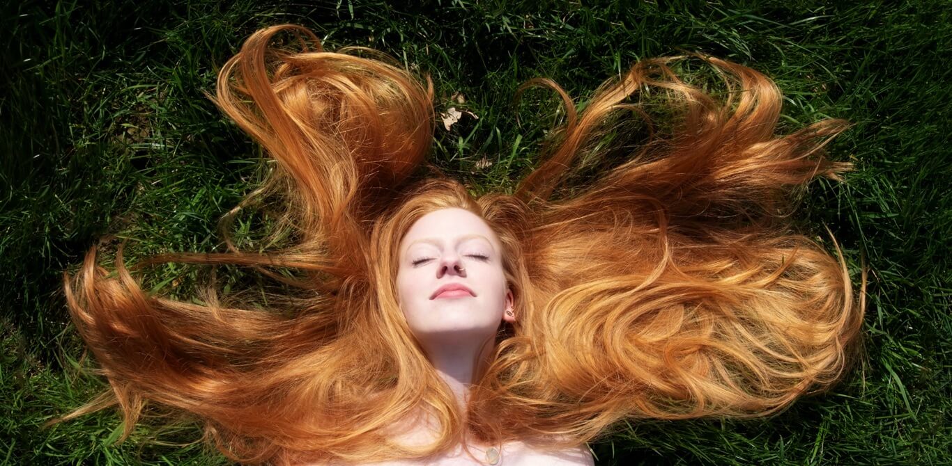 model posing in the garden