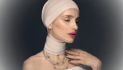 model posing for palstic surgery concept - winter aesthetic treatments