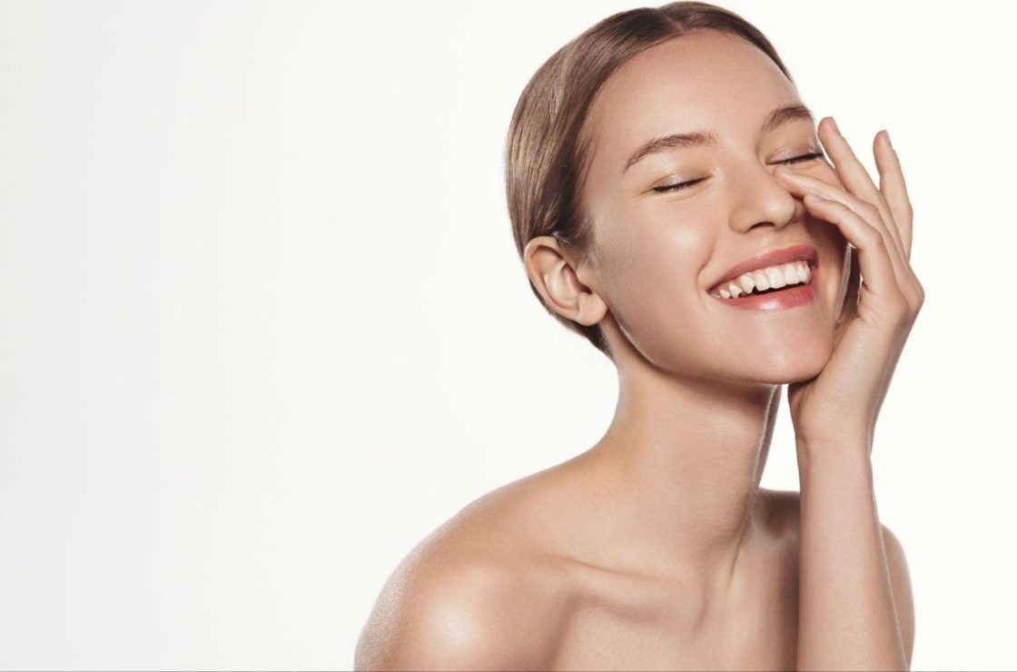 smiling model - hormones and oral health