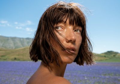 Model posing near flowers fields - Asthma Awareness Month