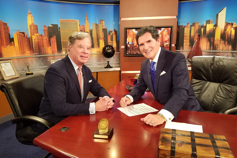 Dr. Darrick Antell, board-certified plastic surgeon, interviewed on a New York City news set