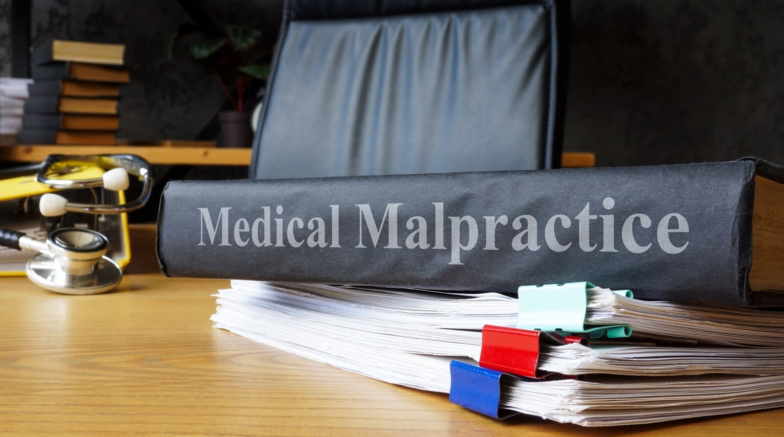 medical malpractice documents on a table