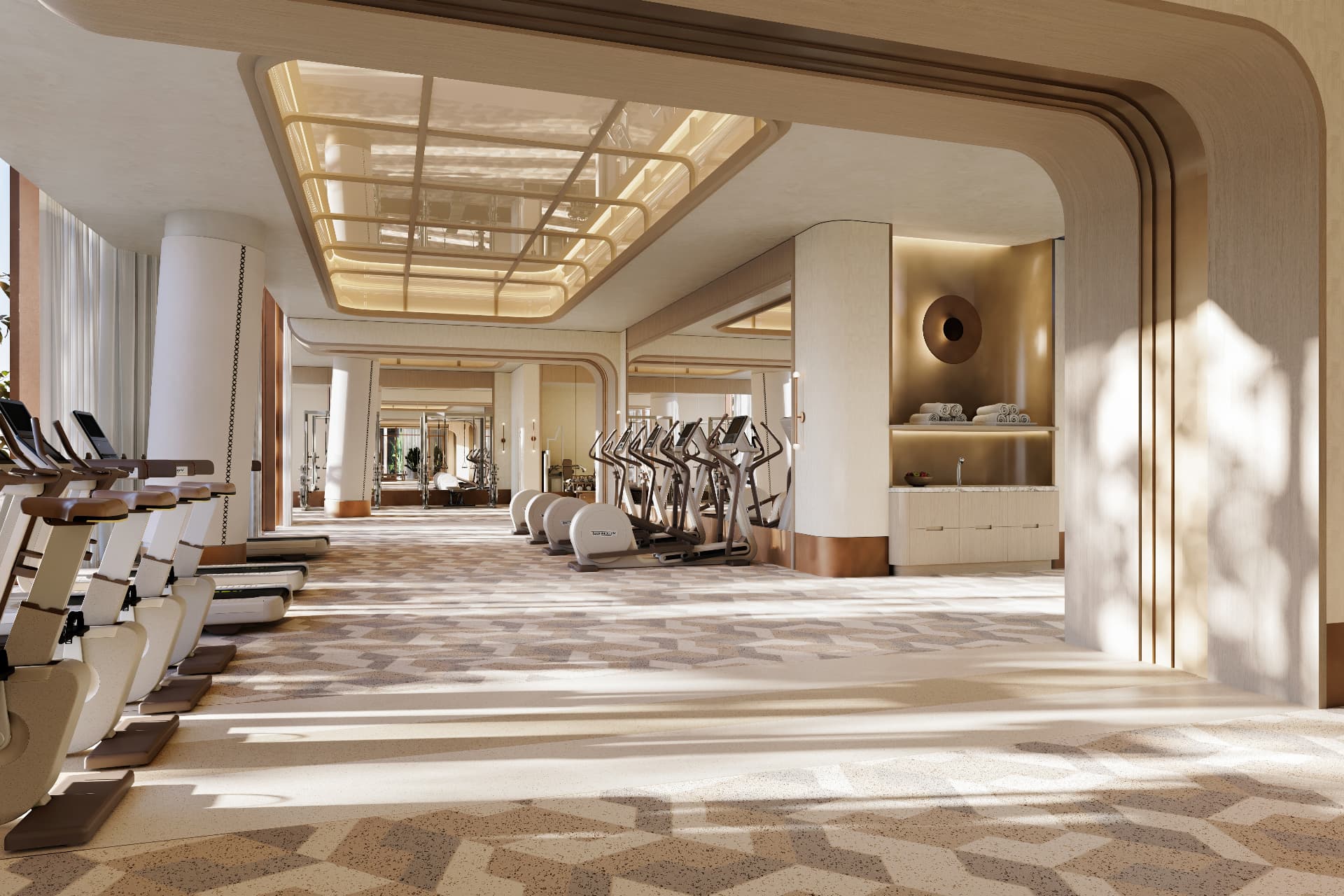Fitness center at Waldorf Astoria Residences Sarasota with arched detailing and cardio equipment