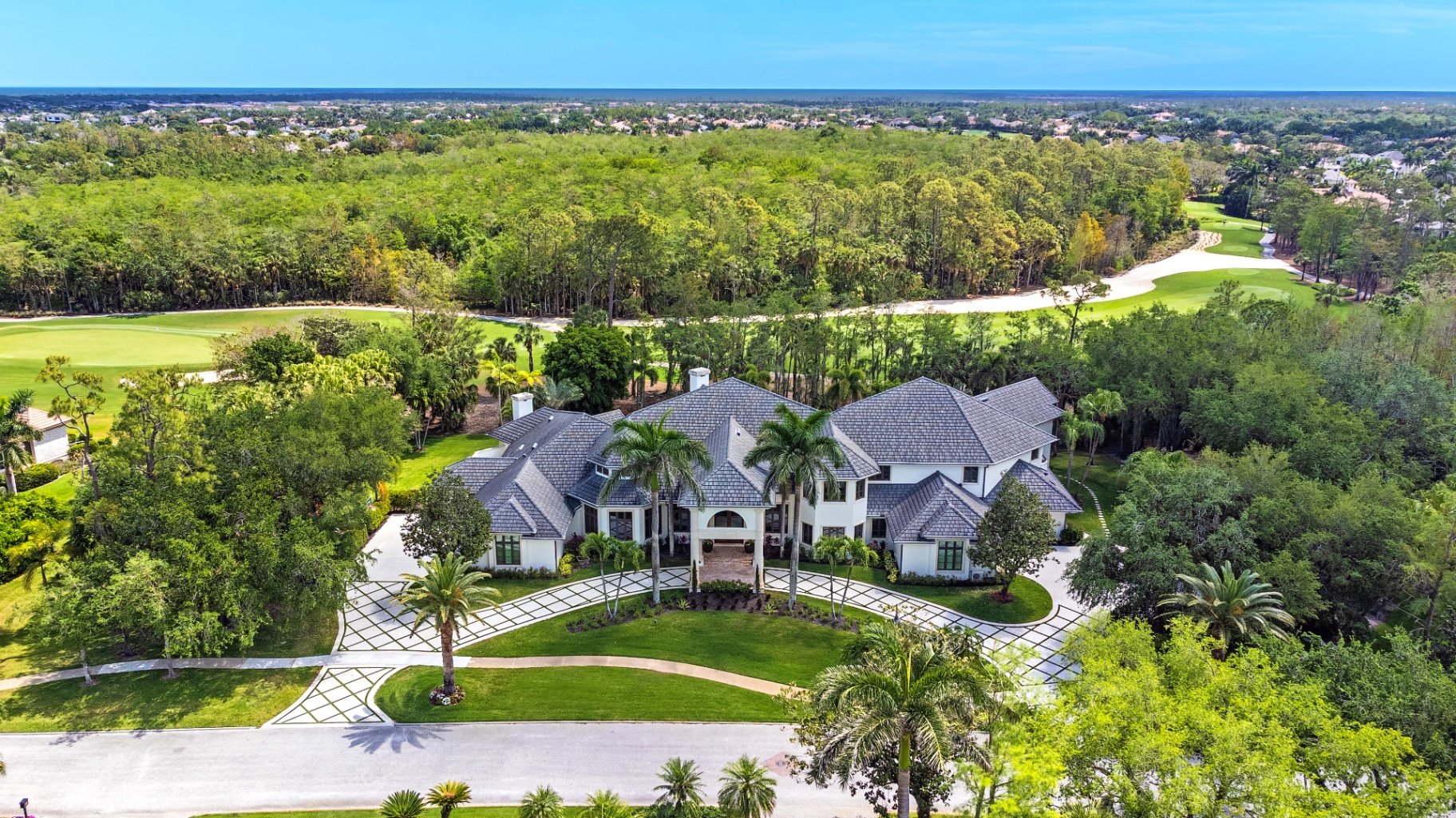 Aerial view of 4300 Brynwood Drive estate in Quail West, Naples