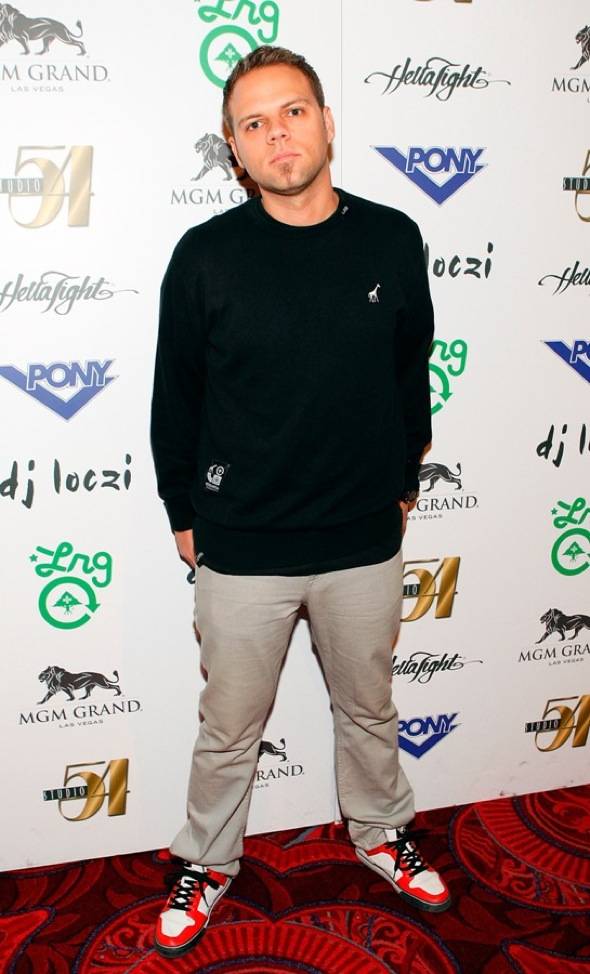 DJ Loczi on red carpet at Studio 54 for Electric Dream, Dec. 31, 2010