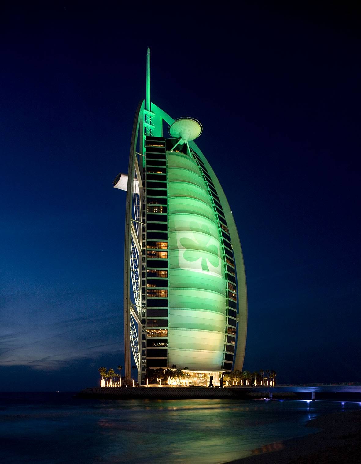 Burj Al Arab lights up ‘green’ and joins the worldwide greening of city icons saluting the Irish community in Dubai by donning the traditional shamrock.