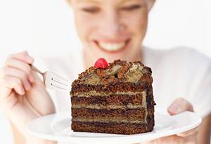 20100702-woman-eating-chocolate-cake-300×205