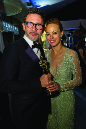 Best Director winner Michel Hazanavicius for The Artist with Best Actress in a Support Role nominee For The Artist BÃ©rÃ©nice Bejo