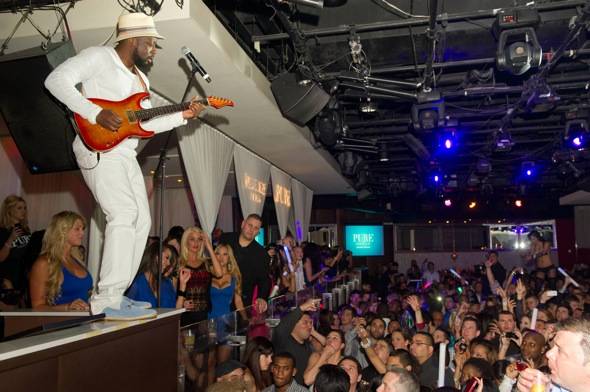 Artist and performer, Wyclef Jean, performs at Pure Nightclub