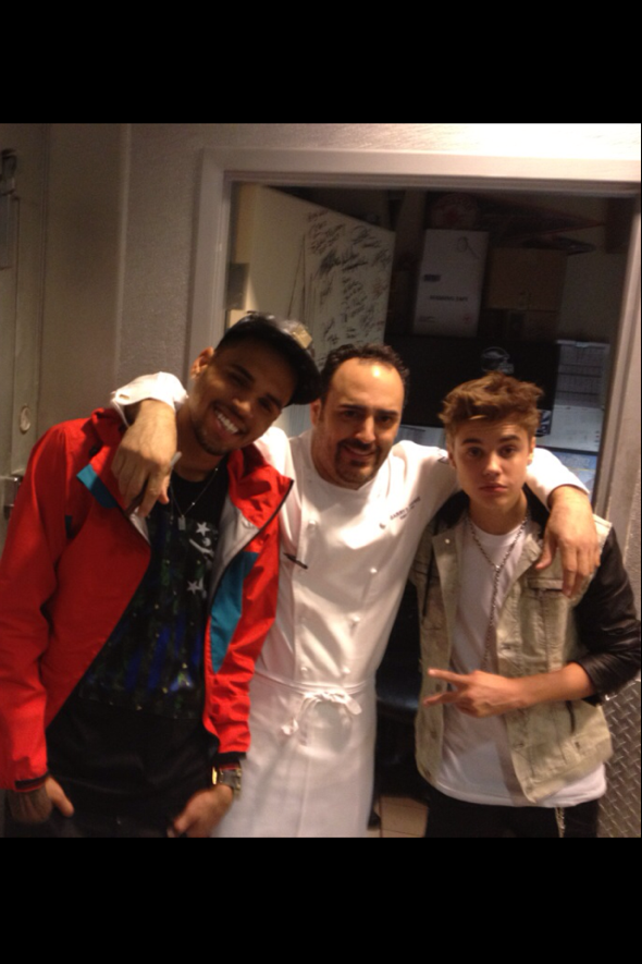 Chris Brown, chef Barry Dakake and Justin Bieber at N9NE Steakhouse in Palms Resort Casino in Las Vegas 5.20.12