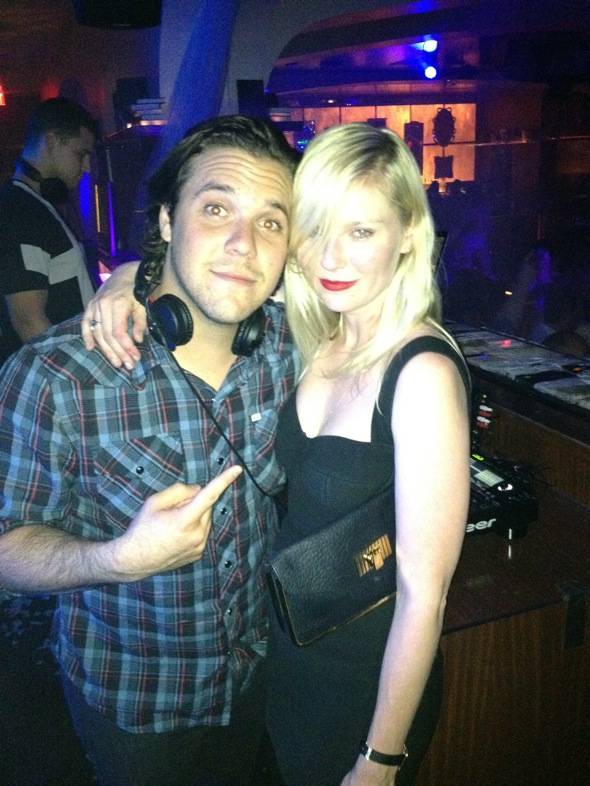 Kirsten Dunst and DJ DiJiTAL in Hyde Bellagio's DJ booth, Las Vegas, 5.18 - low