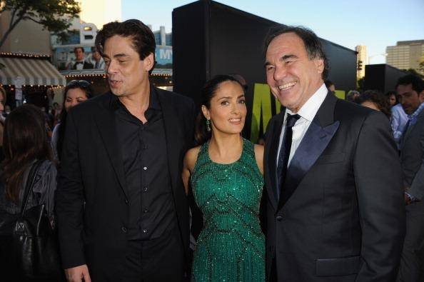 Benicio del Toro, Salma Hayek and Oliver Stone/Getty Images 