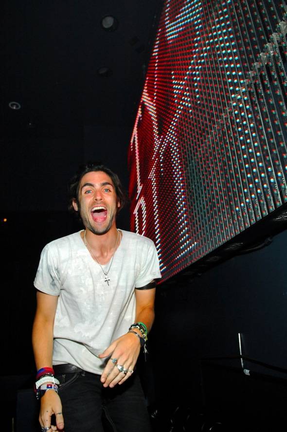 Tyson Ritter rocks out in DJ booth