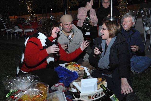 Guests laughing waiting for concert to begin