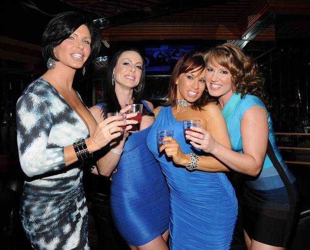 Adult film actresses toasting