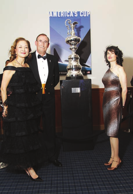 Norbert Bajurin with the America’s Cup on display during the Commodore’s Ball