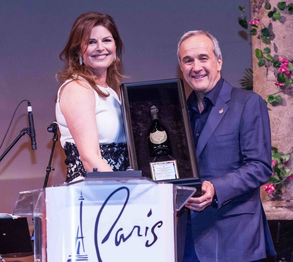 Elizabeth Blau accepting Dom Perignon Award of Excellence from Larry Ruvo at UNLVino's Grand Tasting, 4.20. 2013