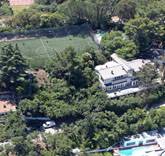 Robbie Williams Sells Westside Home with Soccer Field for $3.2 Million