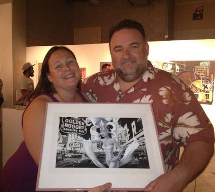 Wendy & Mark Wallington with their piece of art purchased at Framing Hope