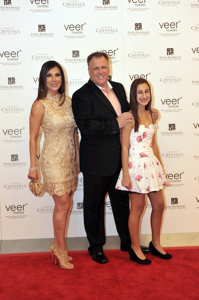 11. Jim Navarro, VP of Sales for Pordes Residential with his wife Maria and their daughter