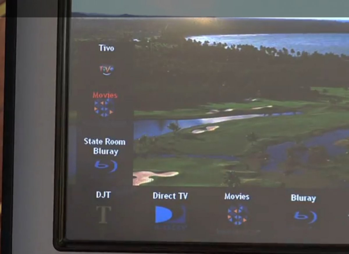 check-out-the-golf-course-background-on-the-remote-the-t-button-is-a-shortcut-to-trumps-favorite-movies