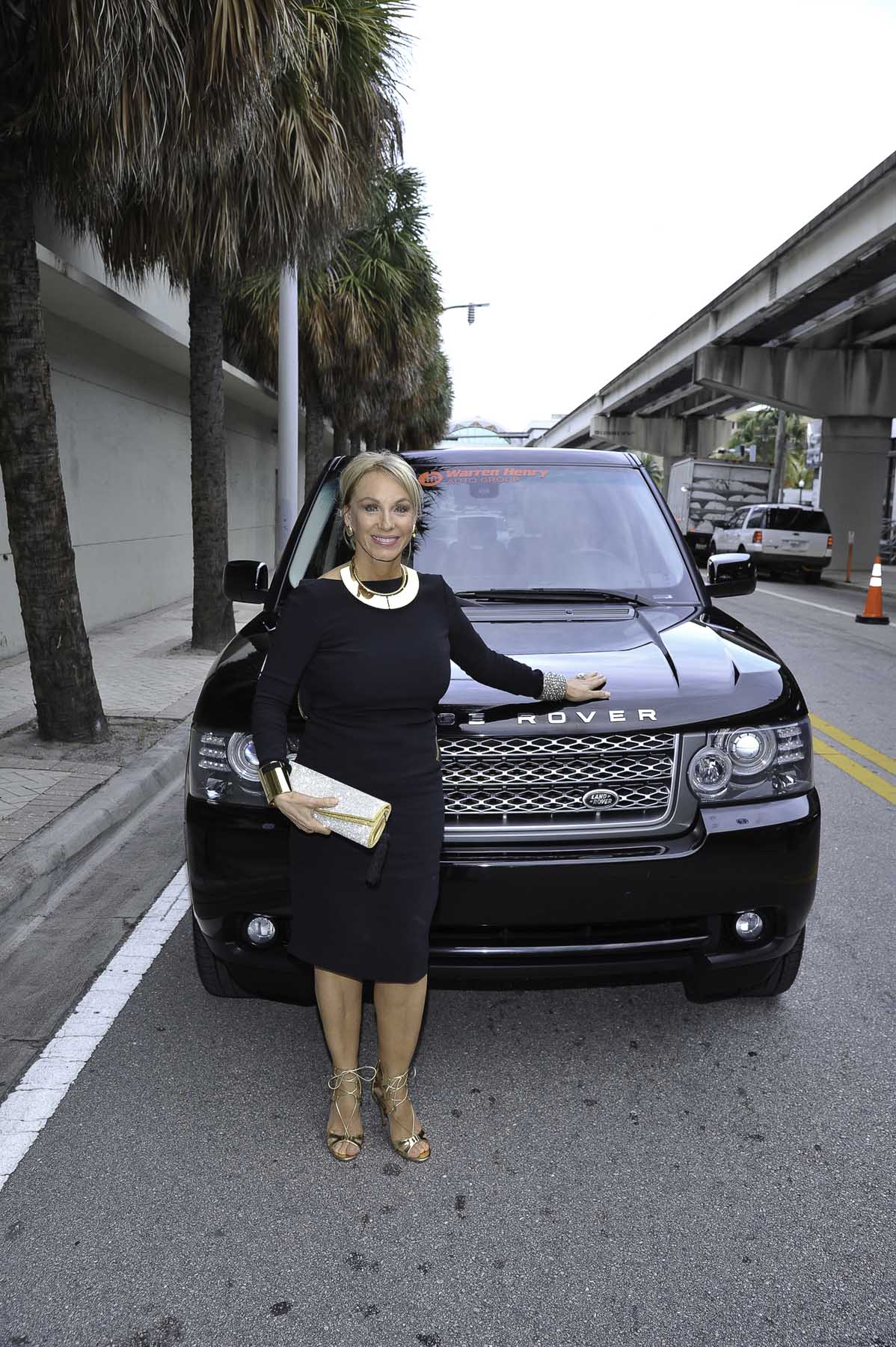 Lea Black of The Real Housewives of Miami – Season 3 with a Range Rover from Land Rover North & South Dade, divisions of Warren Henry Auto Group