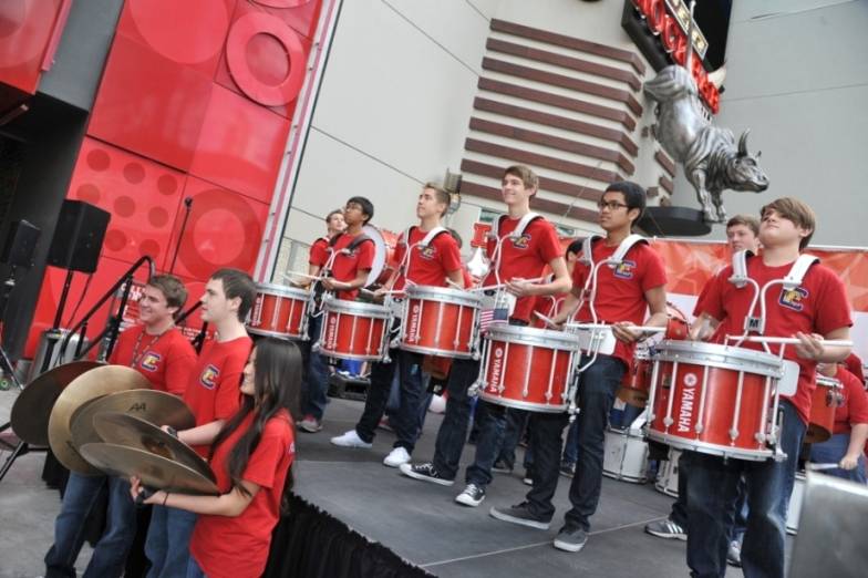 Coronado High School Drum Line performed on stage outside PBR Rock Bar at Miracle Mile Shops During USA Sevens Rugy Pep Rally for USA Eagles