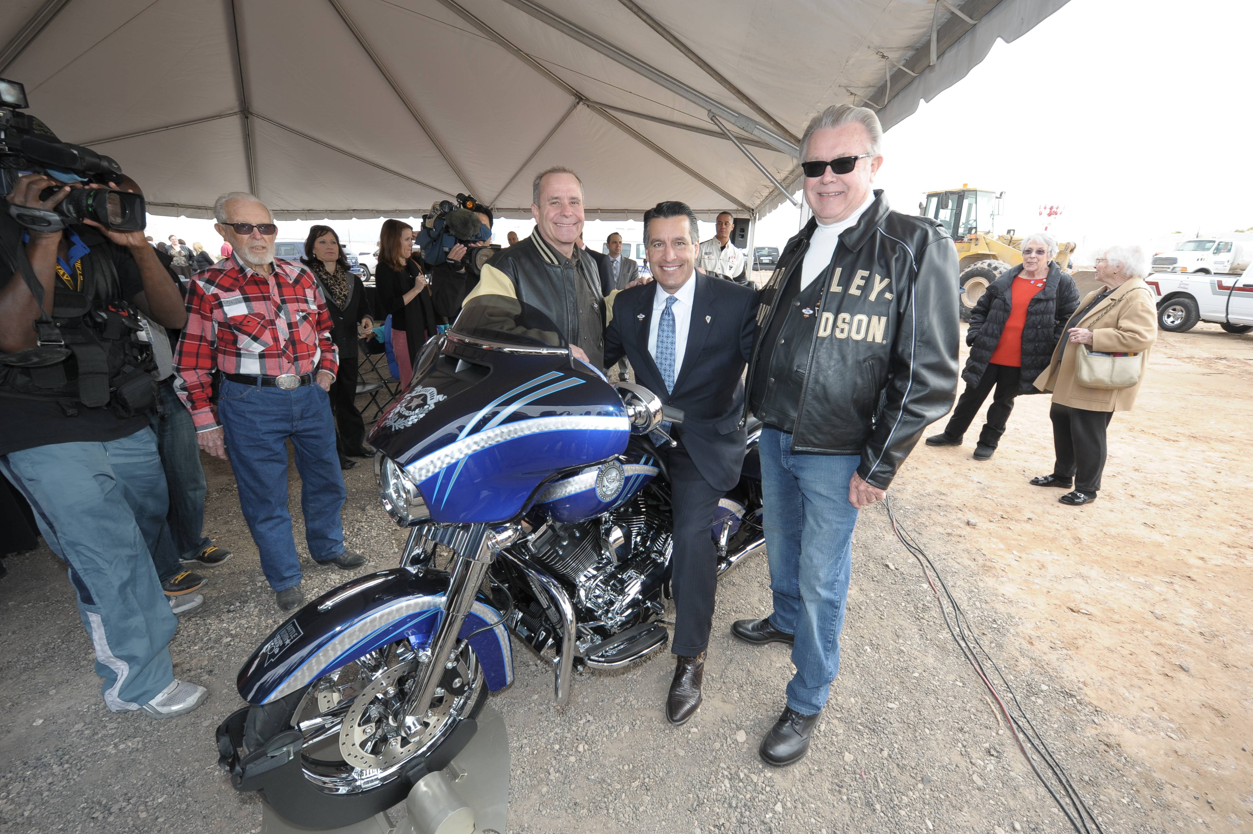 Las Vegas Harley-Davidson Vice President Timothy Cashman, Governor of Nevada Brian Sandoval, Las Vegas Harley-Davidson President Don Andress