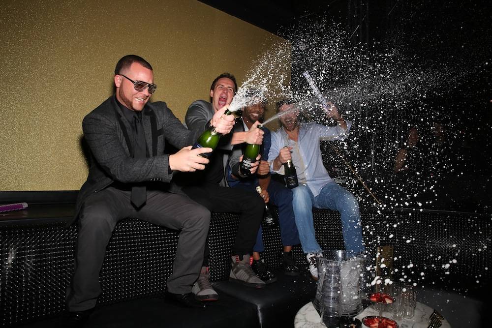 Lochte and Friends Pops Bottles to Celebrate 2014 at SHe by Morton's in Las Vegas