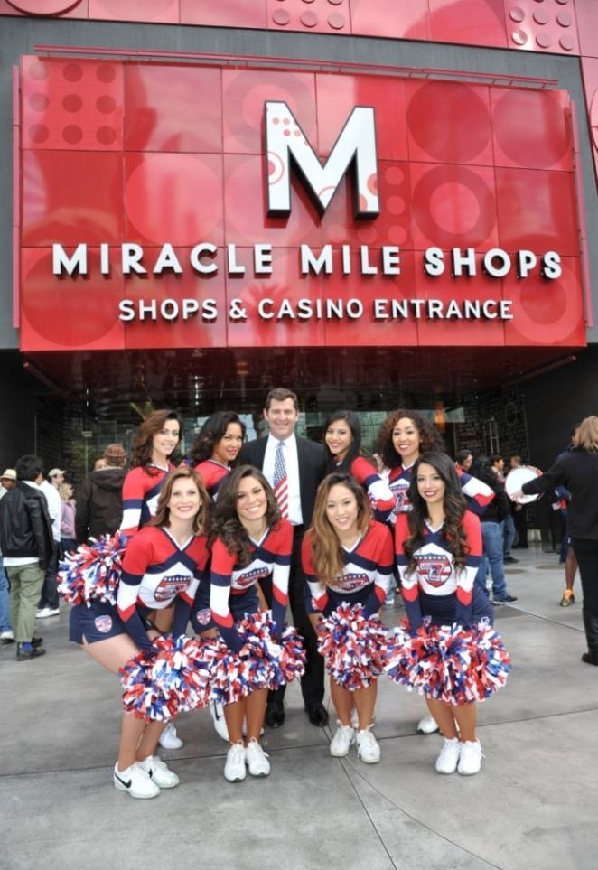 Miracle Mile Shops General Manager Jerry Irwin and USA Eagles Cheerleaders