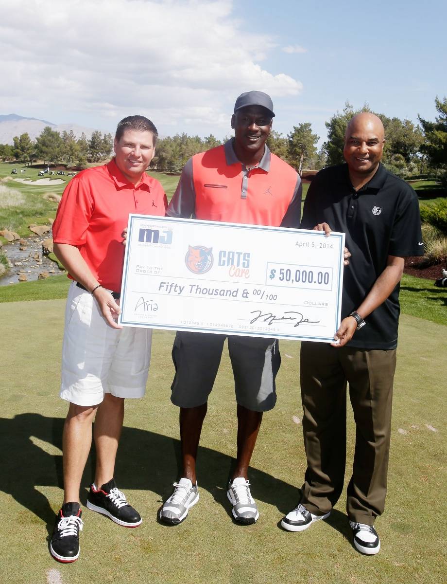 Executive Vice President MGM Resorts International Tyler Shook (L) and NBA legend Michael Jordan and Bobcat's Sports and Entertainment President & Coo Fred Whitfield