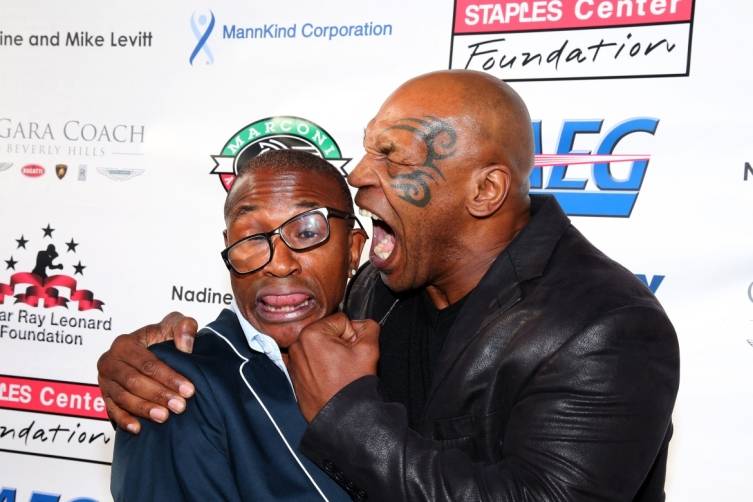 Tommy Davidson and Mike Tyson pose at SRL Foundation Charity Boxing Night - Getty