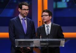 Writer Doug Ellin and actor Kevin Connolly on stage at the 2014 Sports Spectacular Gala