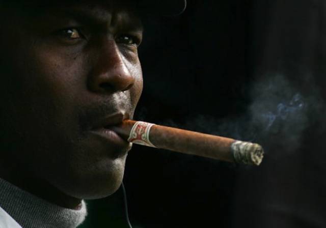 Former NBA legend Michael Jordan smokes